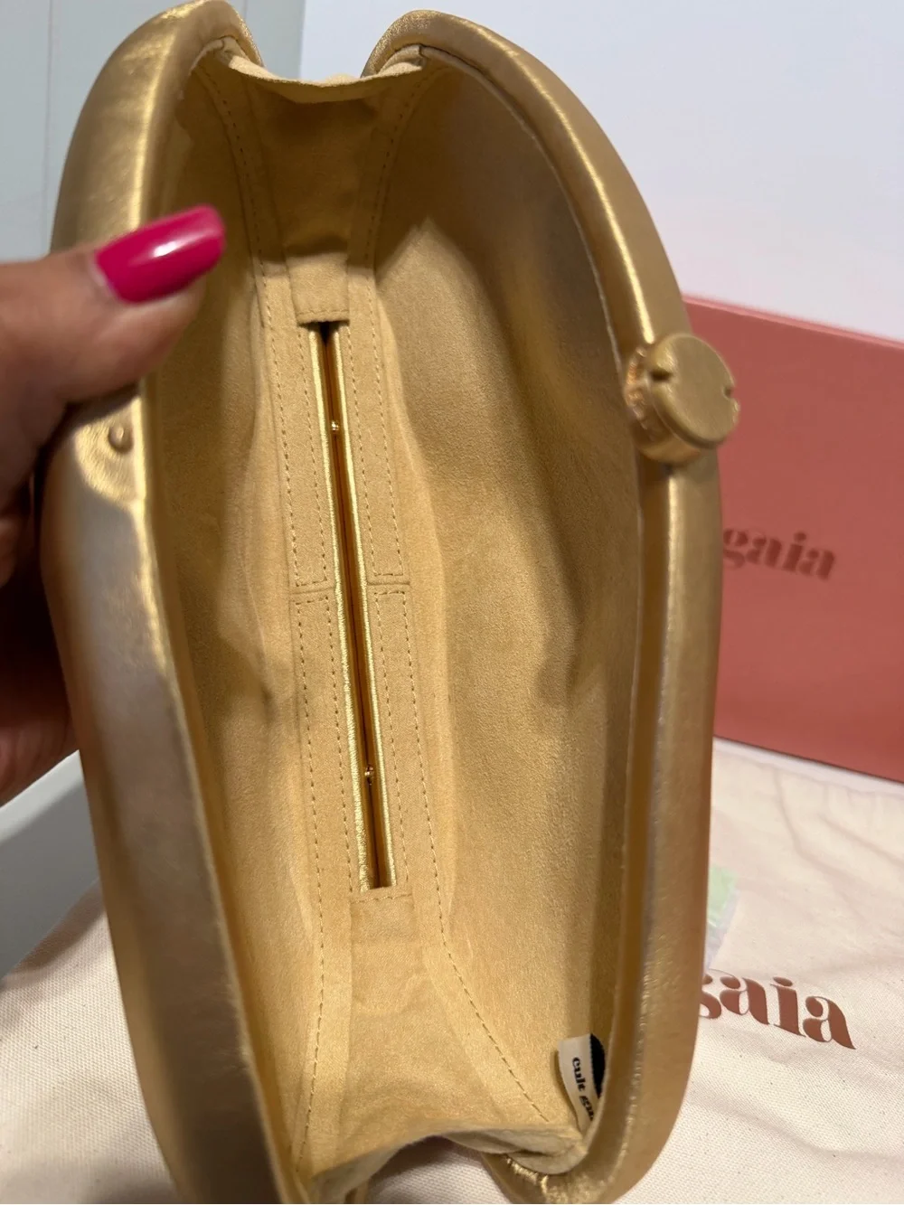 Cult Gaia The Caldera Clutch in Matte Brass